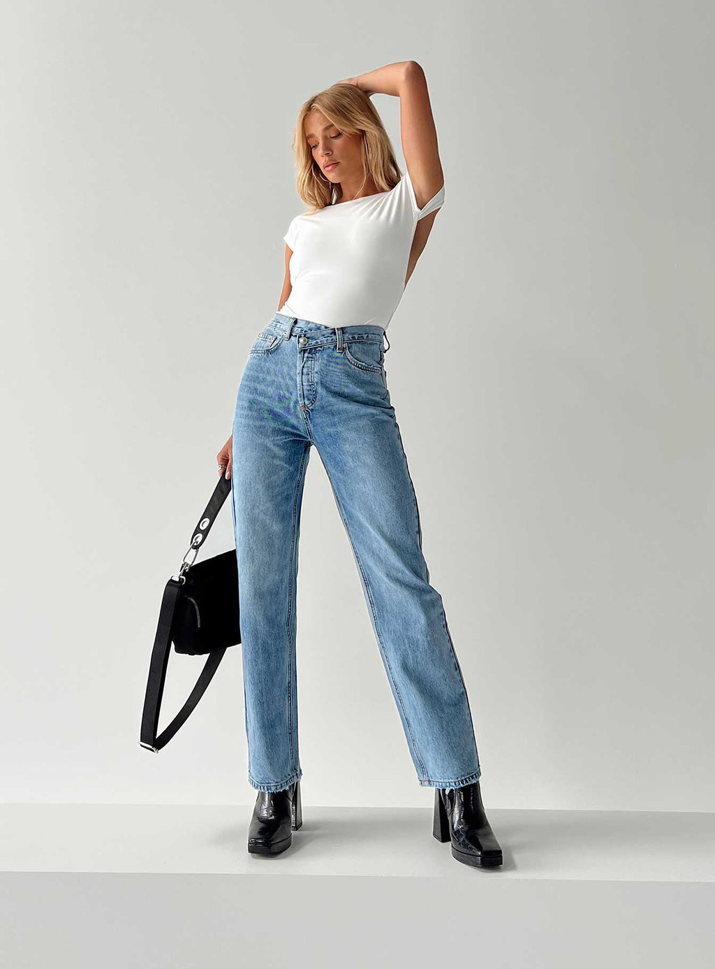Holly Mid Rise Straight Leg Asymmetric Jean Light Wash Denim